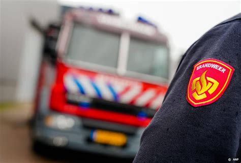 Vier appartementen boven supermarkt afgebrand in Apeldoorn.